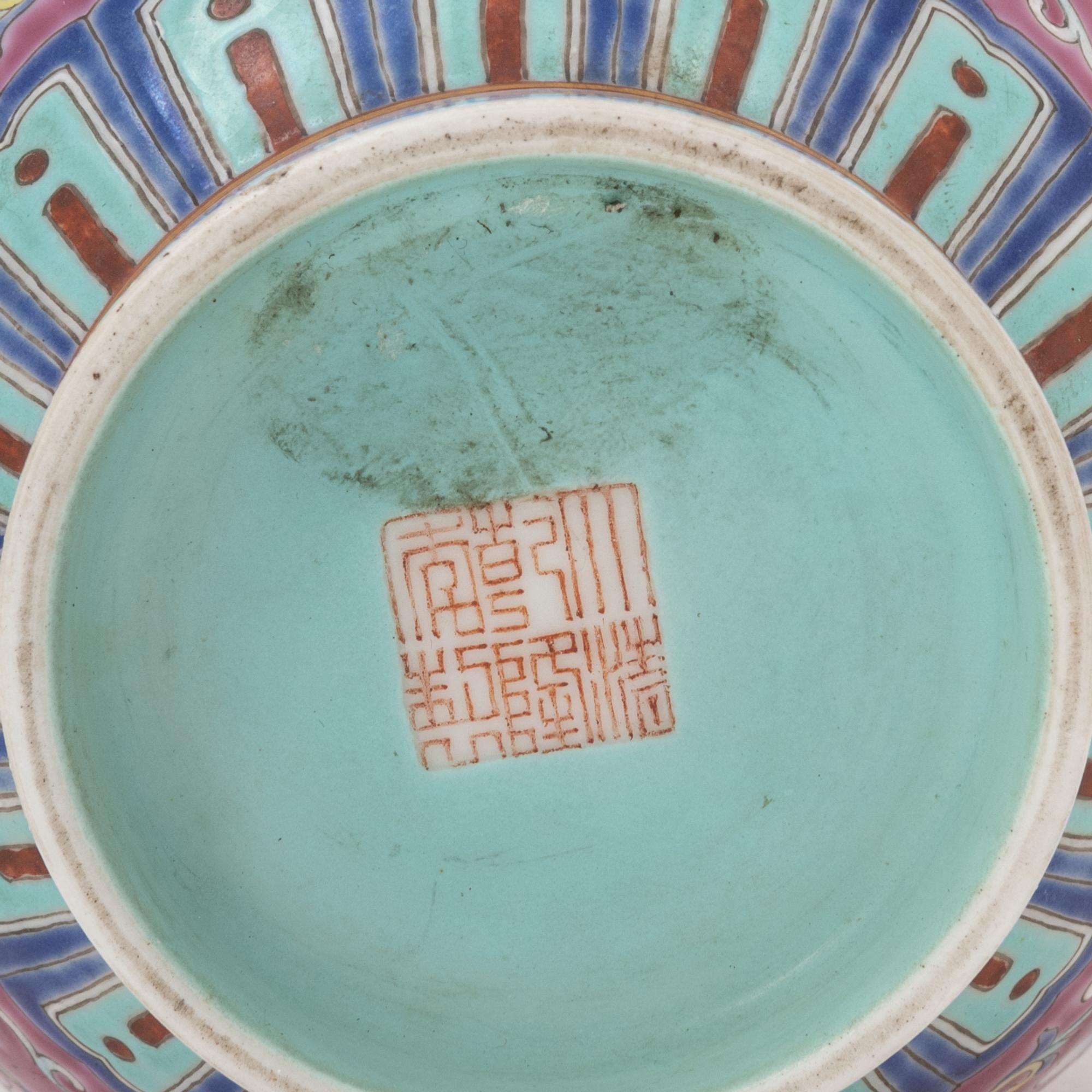 A Chinese Ruby Ground Famille Rose Porcelain Vase