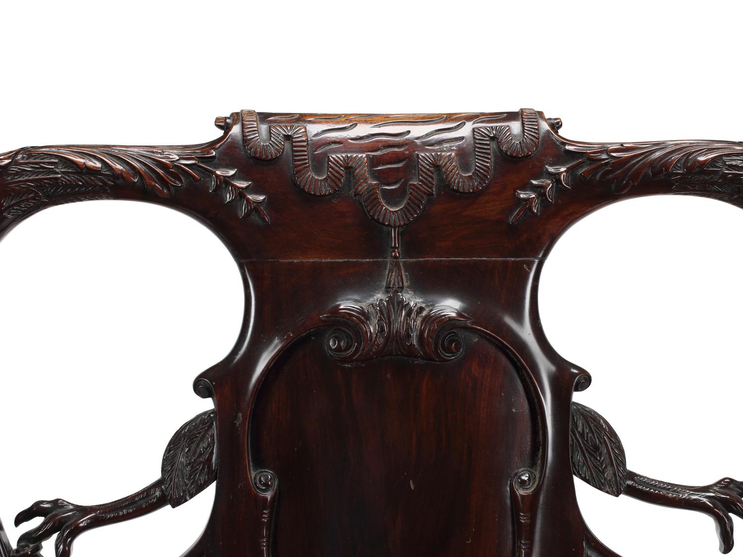 An English Carved Mahogany Leather-Upholstered Armchair