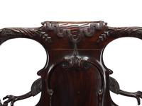 An English Carved Mahogany Leather-Upholstered Armchair