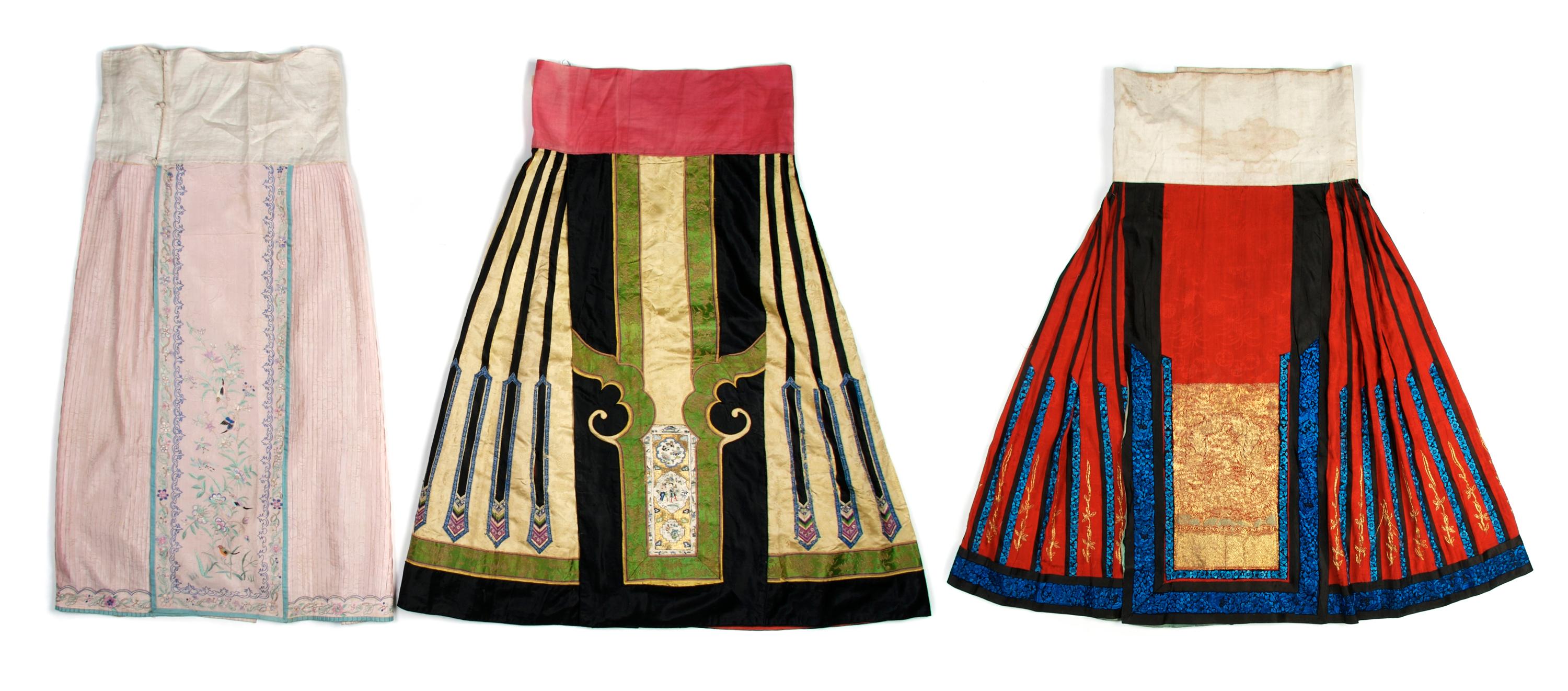 A Group of Three Chinese Silk Skirts, Length of longest 39 inches.