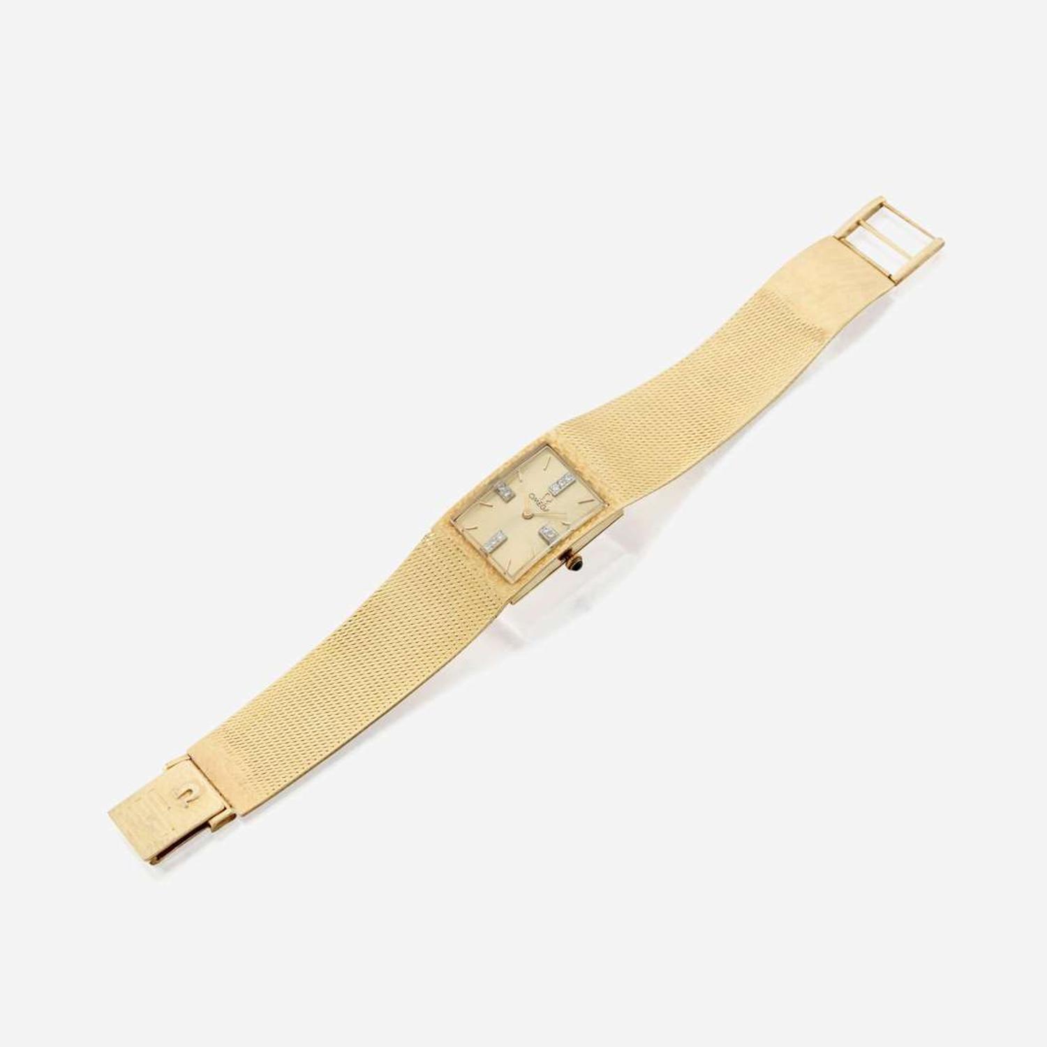A gentleman's fourteen karat gold and diamond bracelet wristwatch, Omega