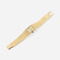 A gentleman's fourteen karat gold and diamond bracelet wristwatch, Omega