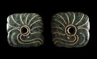 A Pair of Maya Jade Earspools in the Form of a Quetzal Bird