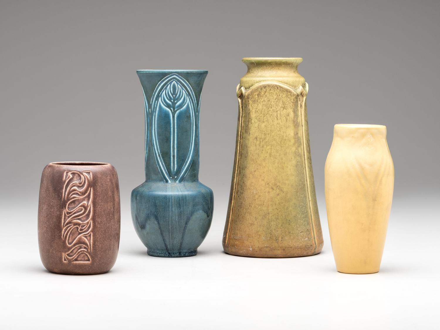 Four Carved Mat Vases
