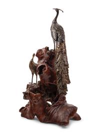 A Bronze Figural Group of Two Peacocks