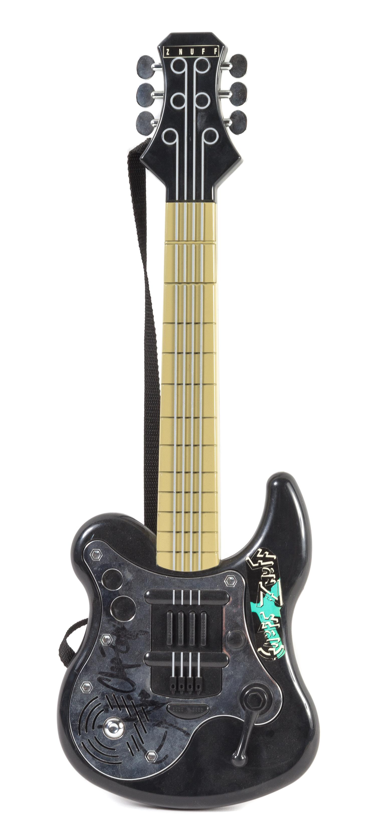 An Enuff Z'Nuff Autographed Toy Guitar Length 21 1/2 inches.
