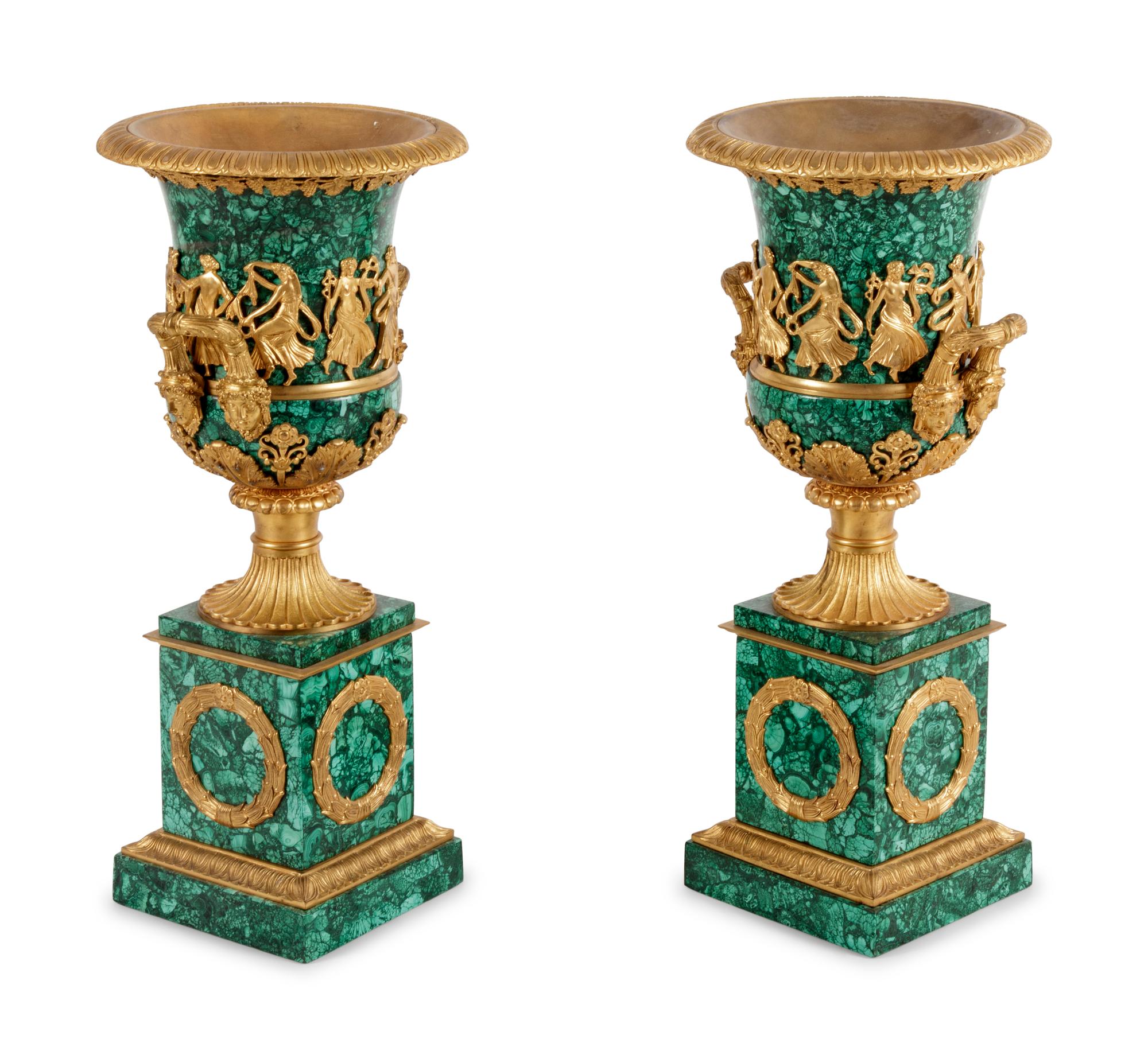 A Pair of Empire Style Gilt Bronze Mounted Malachite Veneered Urns