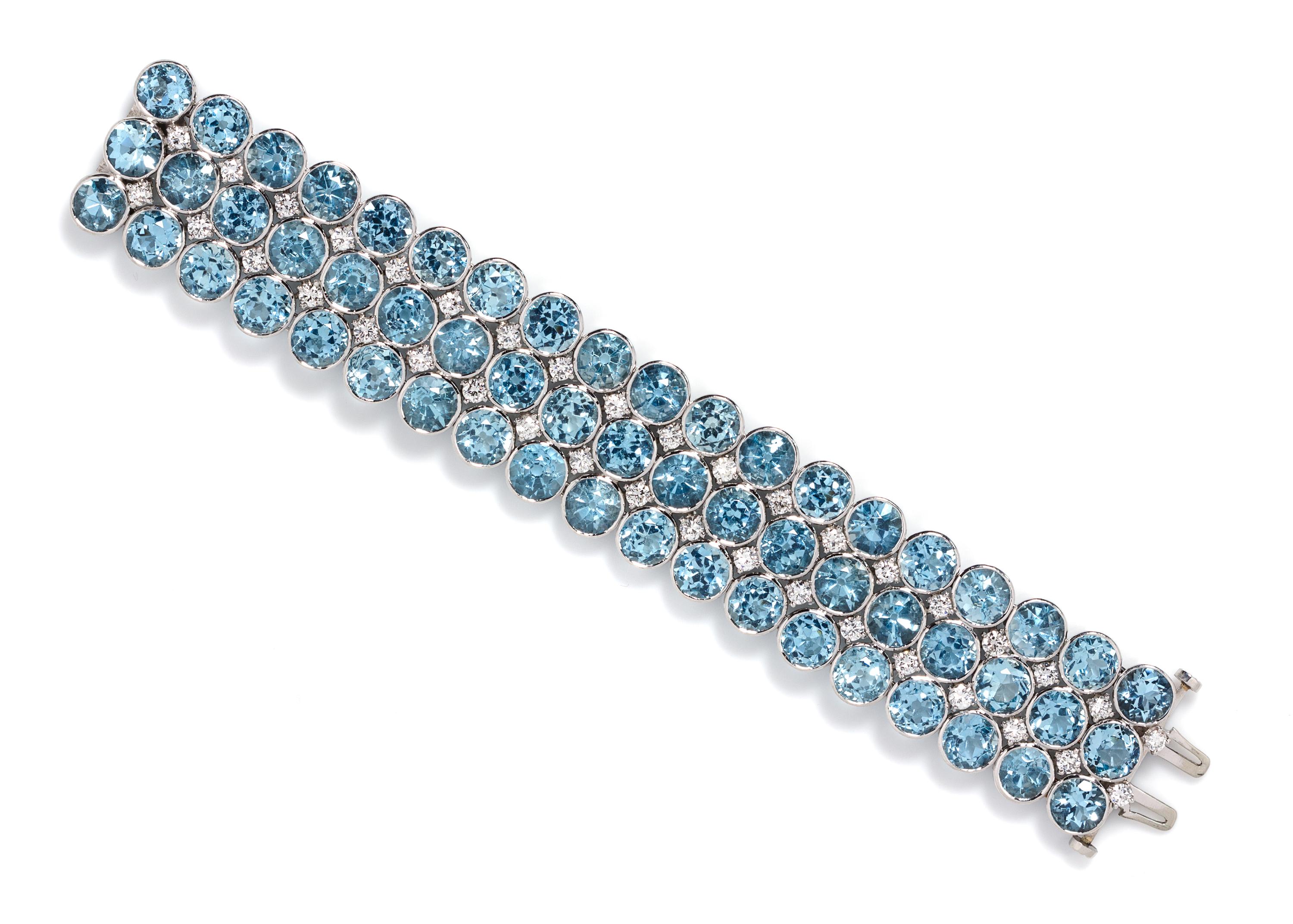 A Platinum, Aquamarine and Diamond Three Row Bracelet, 73.80 dwts.