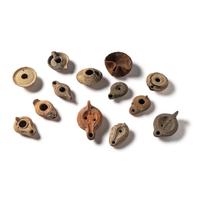 Thirteen Roman and Holy Land Terracotta Lamps