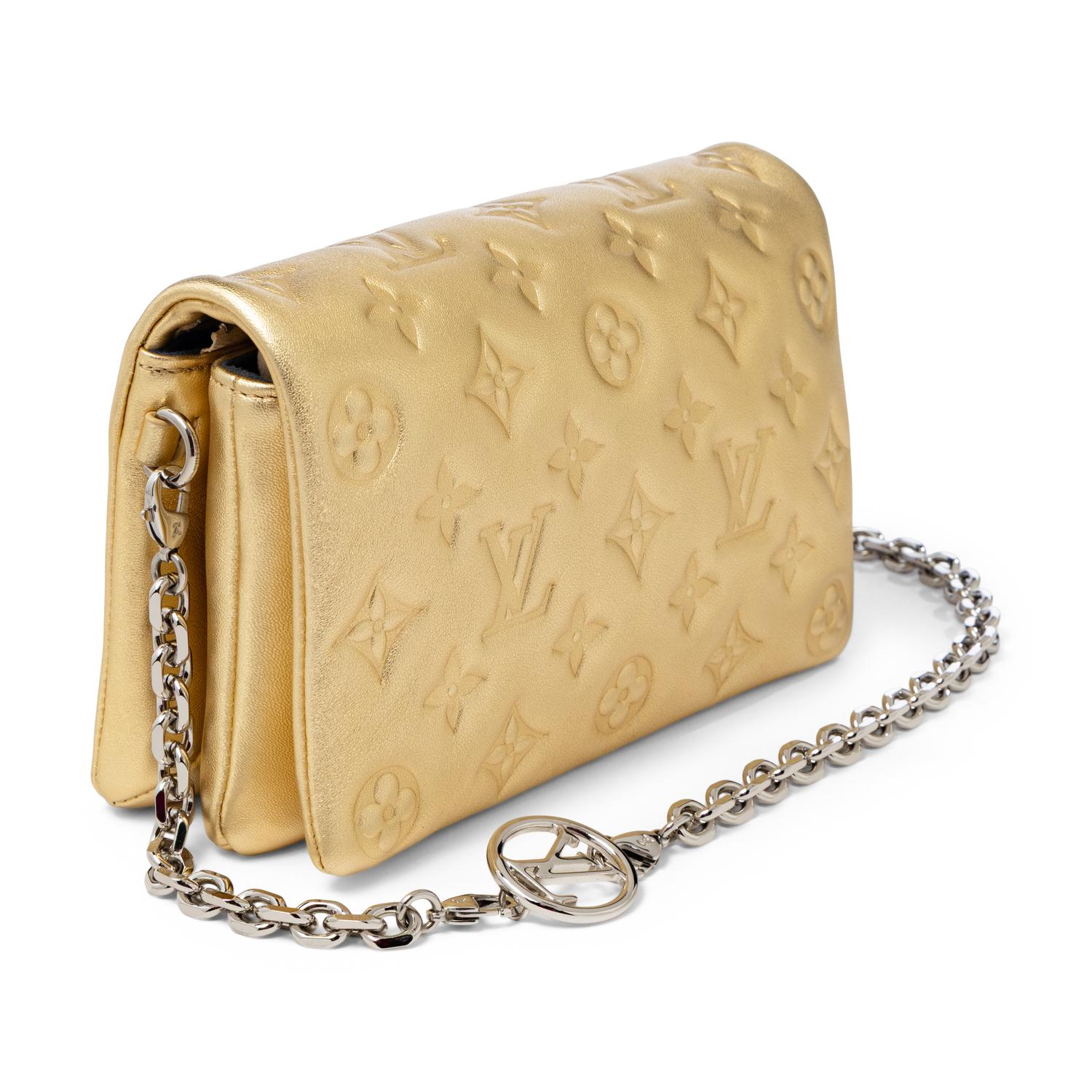 Louis Vuitton, Coussin Bag in Gold Empreinte Leather