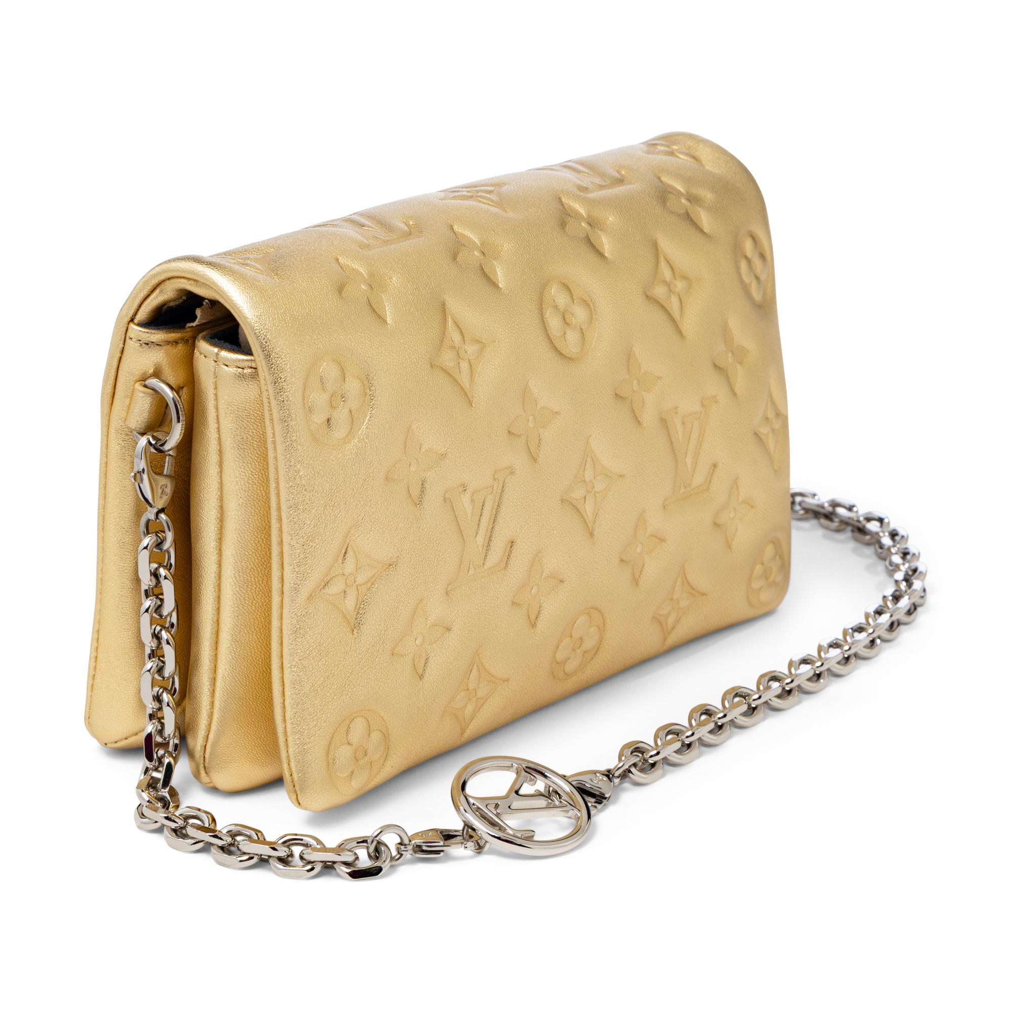 Louis Vuitton, Coussin Bag in Gold Empreinte Leather