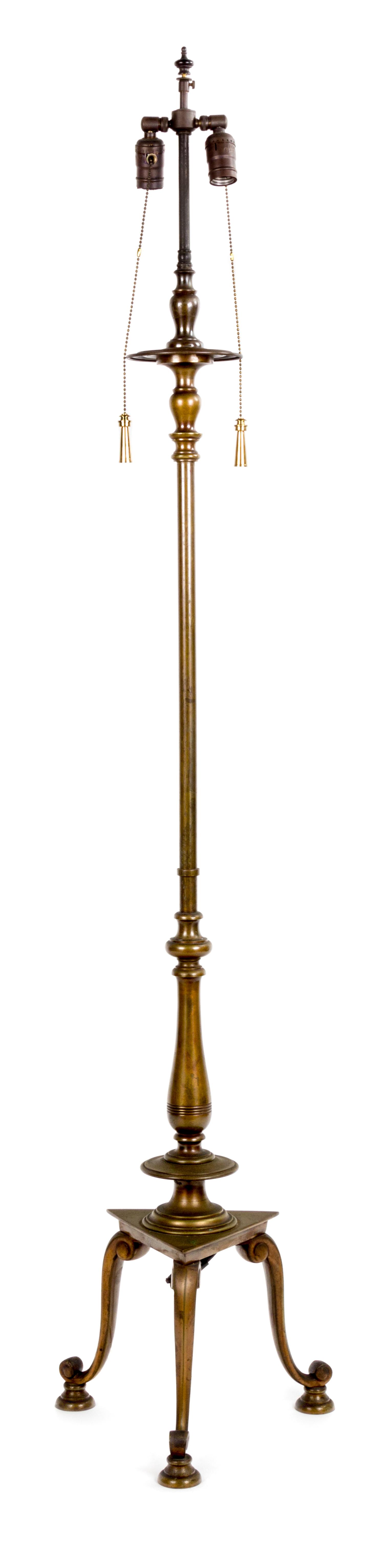A Georgian Style Brass Patinated Metal Standing Lamp Height 48 inches.