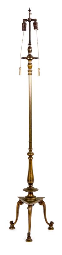 A Georgian Style Brass Patinated Metal Standing Lamp Height 48 inches.