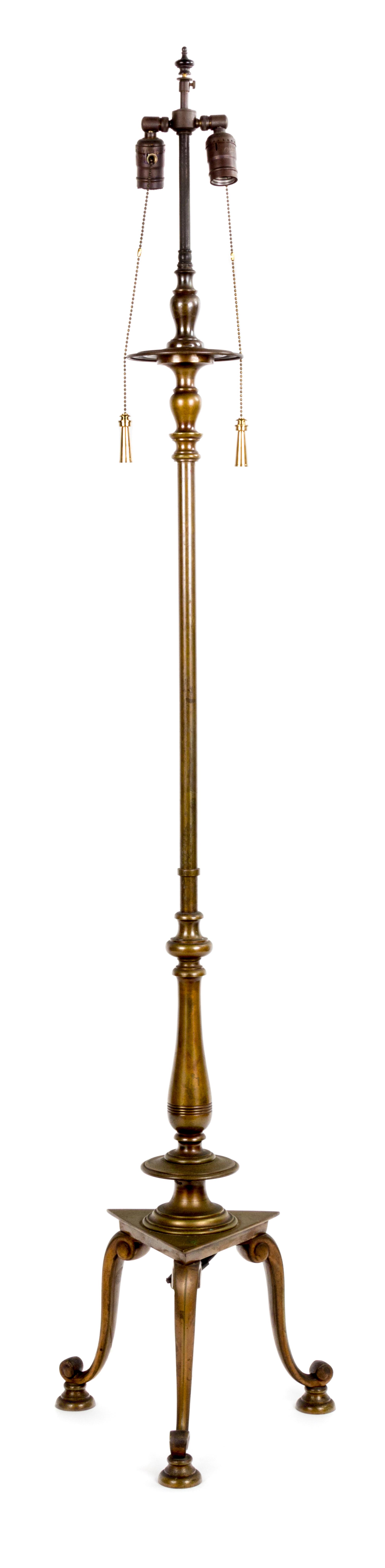 A Georgian Style Brass Patinated Metal Standing Lamp Height 48 inches.