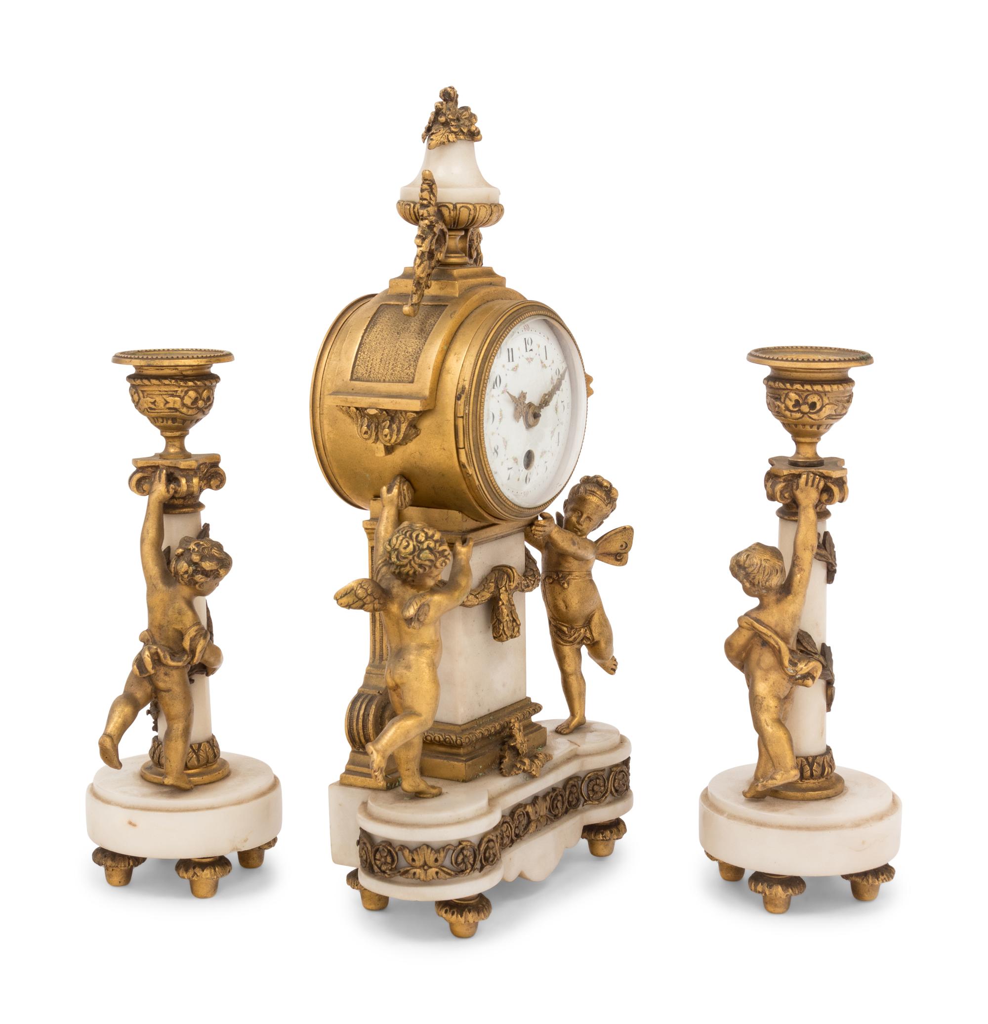 A French Gilt Bronze Mounted Marble Clock Garniture