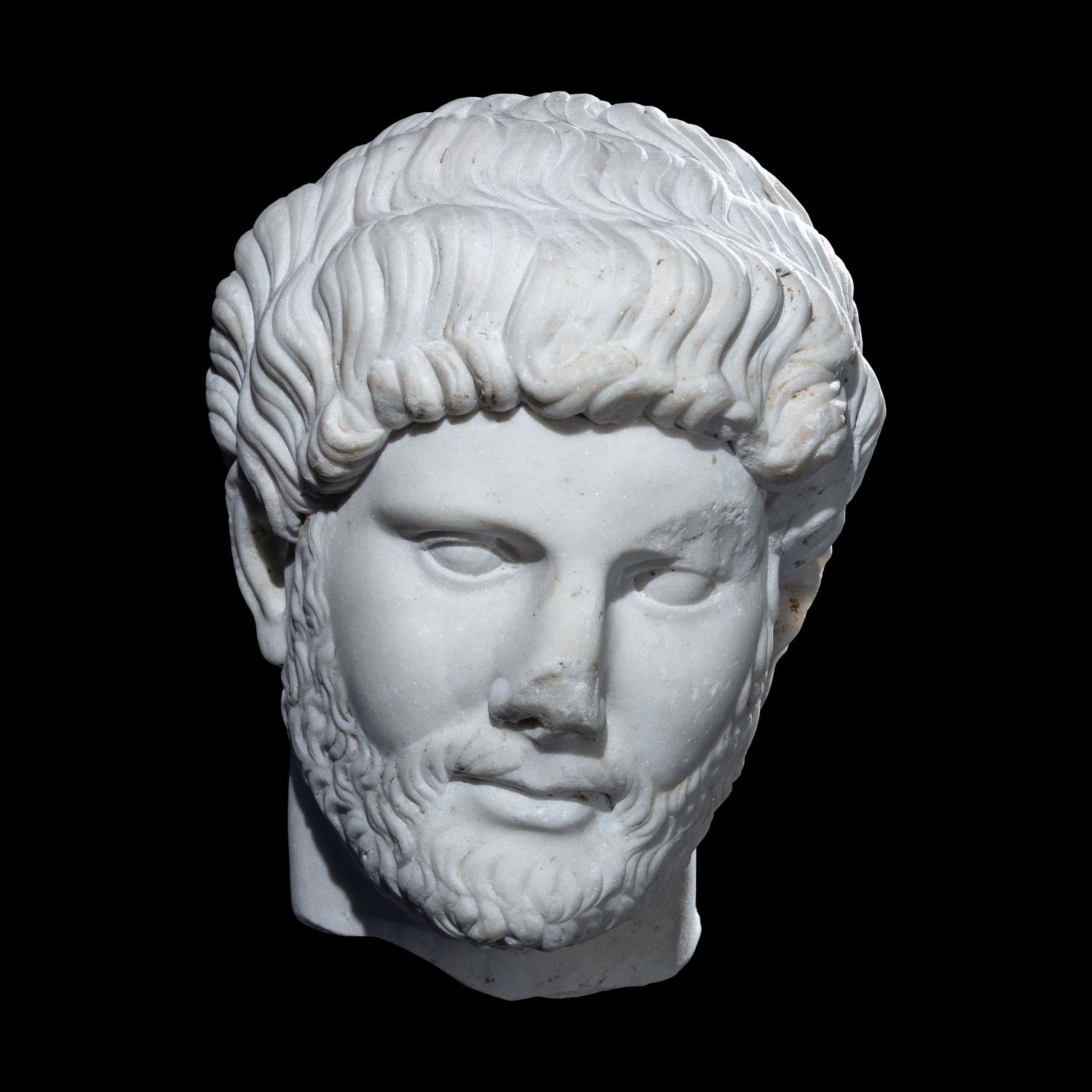 An Over Life-Size Roman Marble Portrait Head of Emperor Hadrian