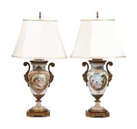 A Pair of Gilt Bronze Mounted Sèvres Style Porcelain Urns Mounted as Lamps