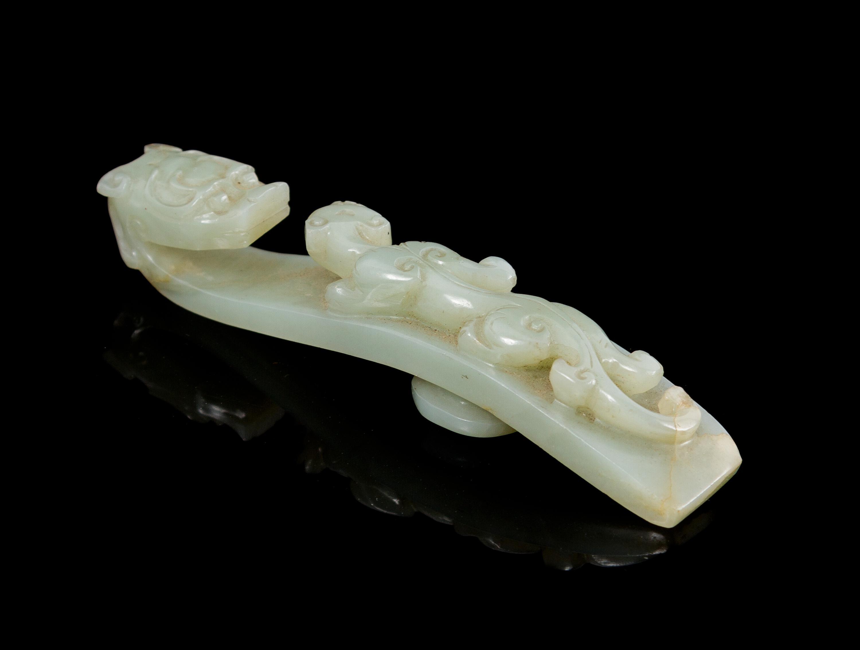 A Jade Belt Hook Width 4 3/8 inches.