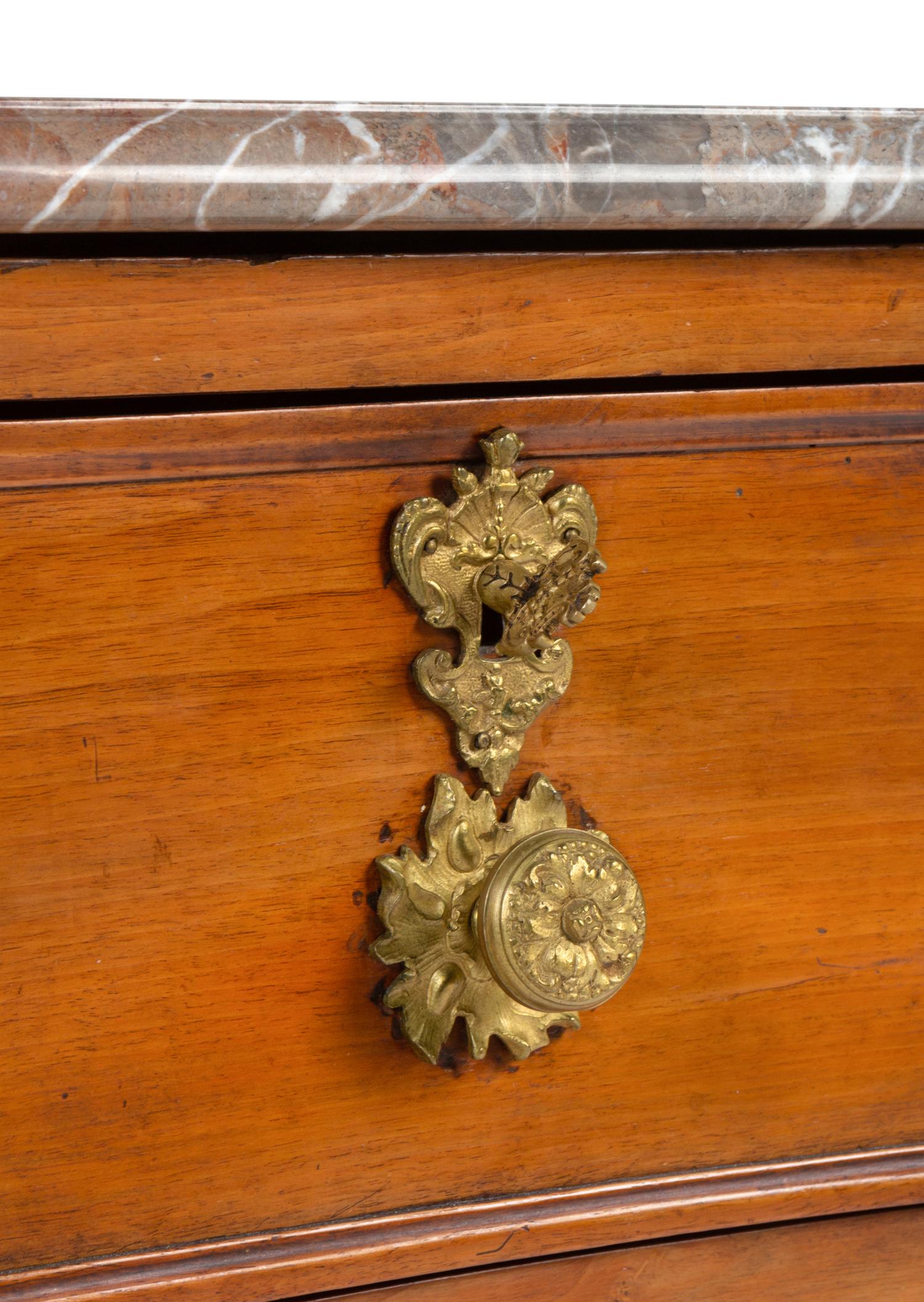 A Louis XV Gilt Bronze Mounted Marble-Top Commode