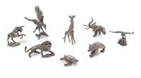A Group of Eight French Silver Miniature Animal Figures, Cartier, Paris, 20th Century, comprising a bull, elephant, seagull, lion, bear