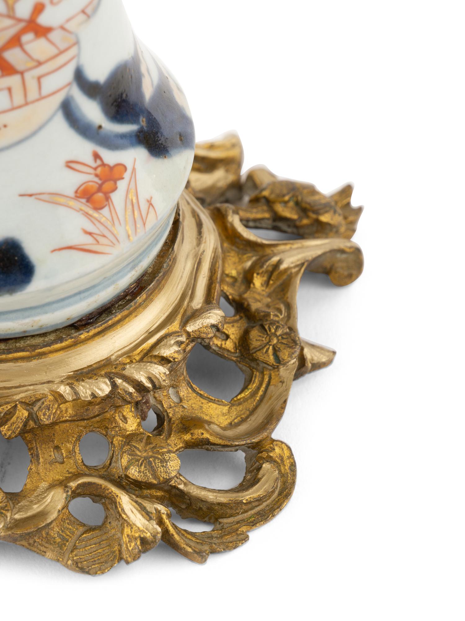 A Pair of Gilt Bronze Mounted Imari Palette Porcelain Vases