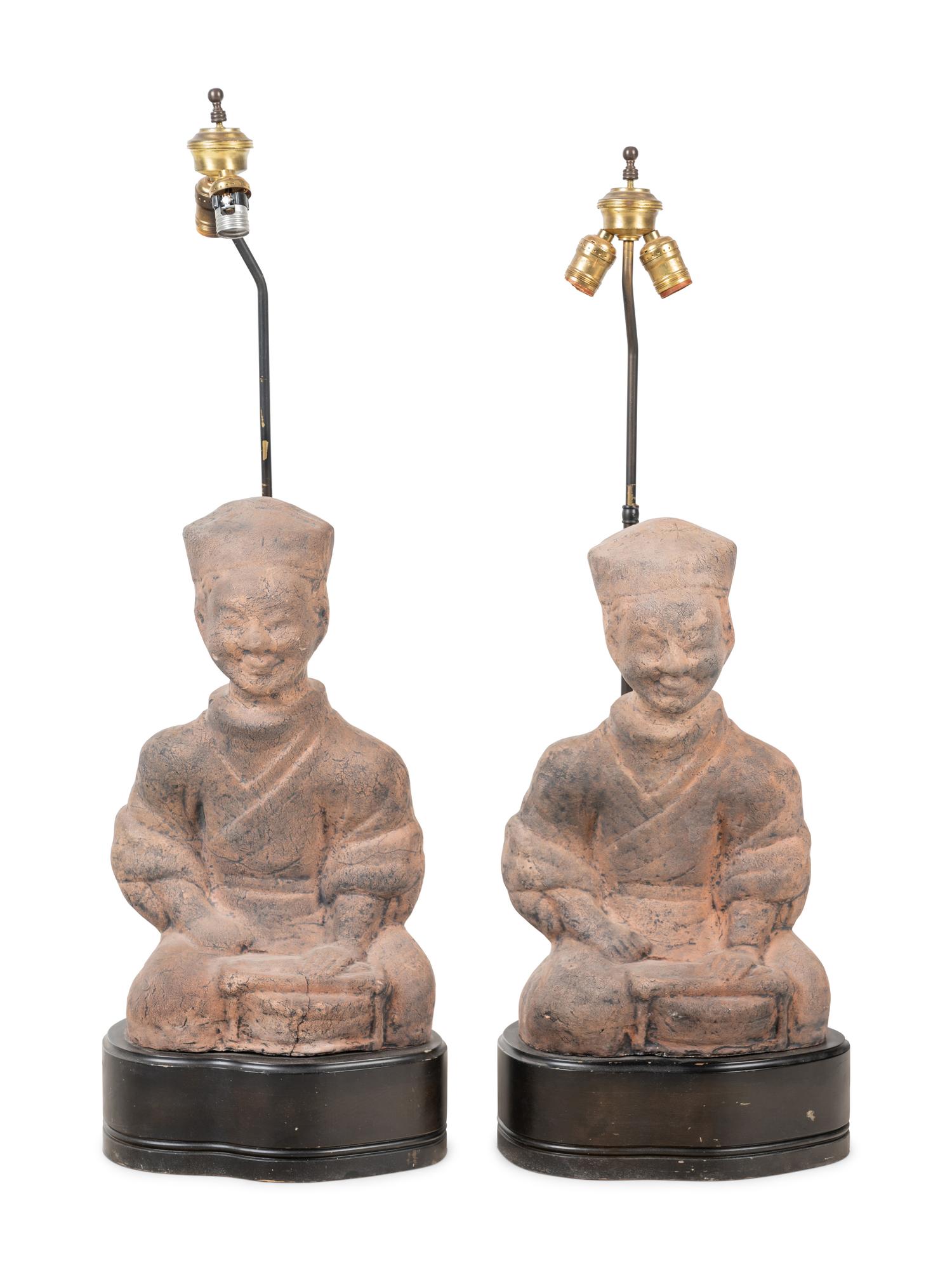 A Pair of Chinese Terra Cotta Figural Lamps