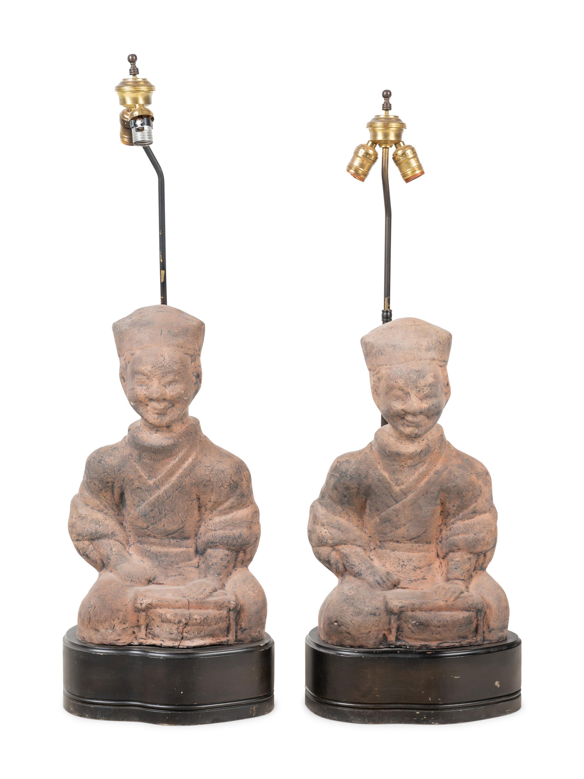 A Pair of Chinese Terra Cotta Figural Lamps