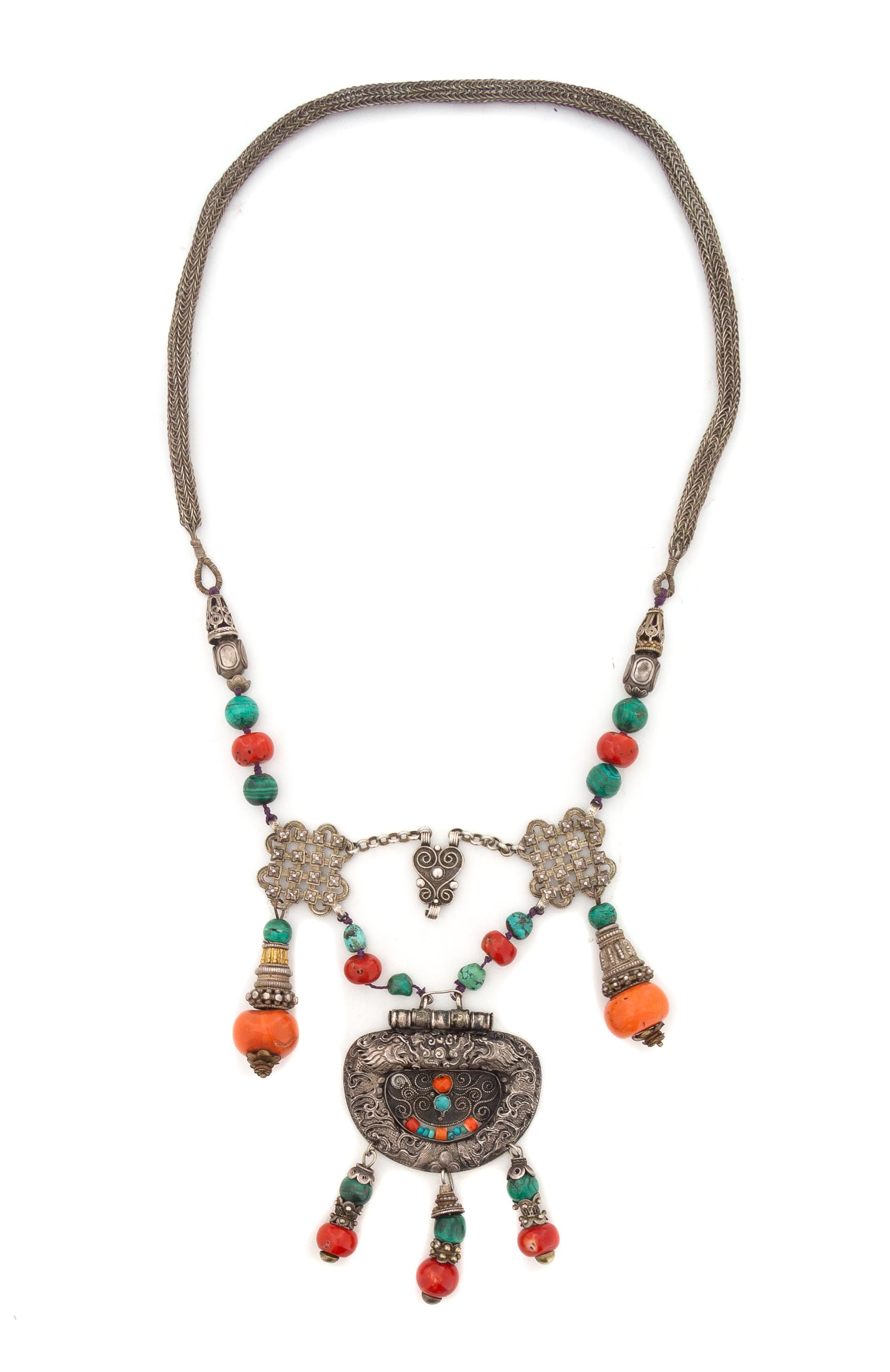 A Tibetan Coral, Malachite and Silver Necklace Length overall 22 1/4 inches. — LATE 19TH/EARLY 20TH CENTURY