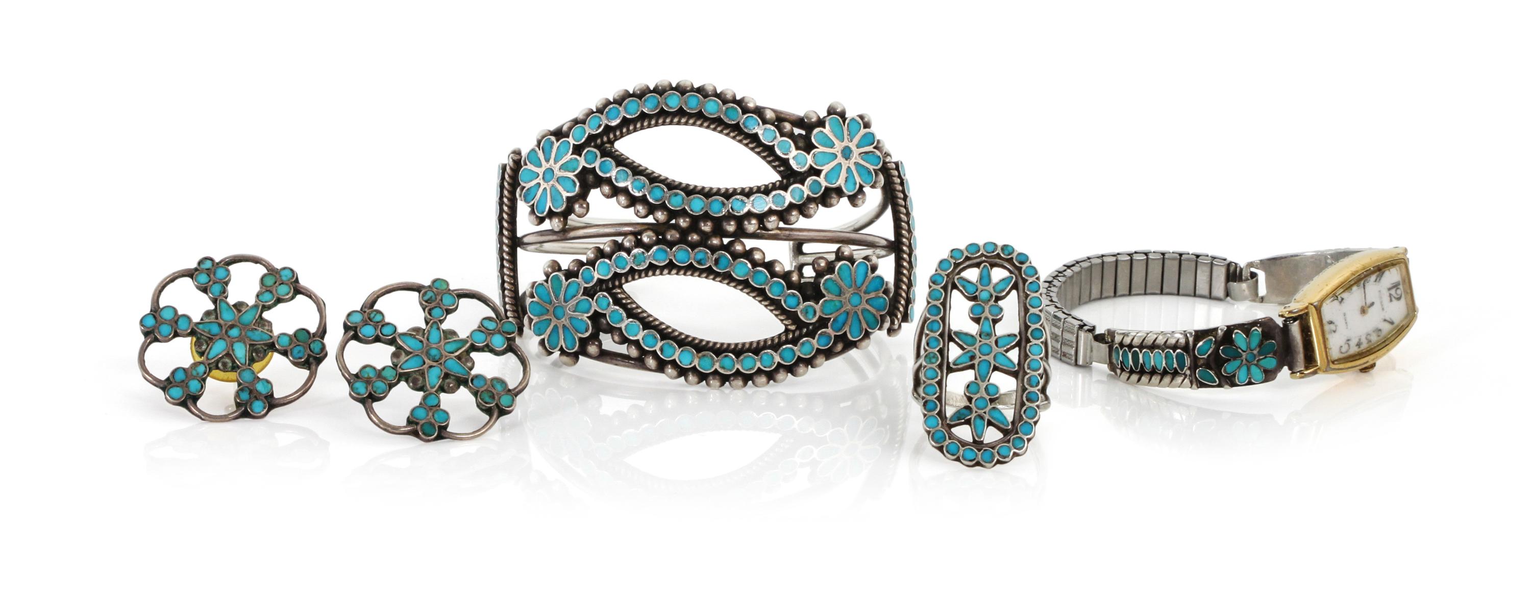 A Zuni Dishta Style Three Piece Set Length of bracelet 5 1/4 x opening 1 x width 1 3/4 inches.