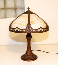 An American Slag Glass Table Lamp. Height 22 x diameter of shade 16 inches.