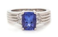 An 18 Karat White Gold, Tanzanite and Diamond Ring, 6.00 dwts.