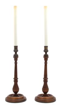 A Pair of English Walnut Columnar-Form Candlesticks Height overall 29 inches. — EARLY 20TH CENTURY