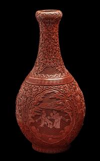 A Chinese Carved Red Lacquer Bottle Vase