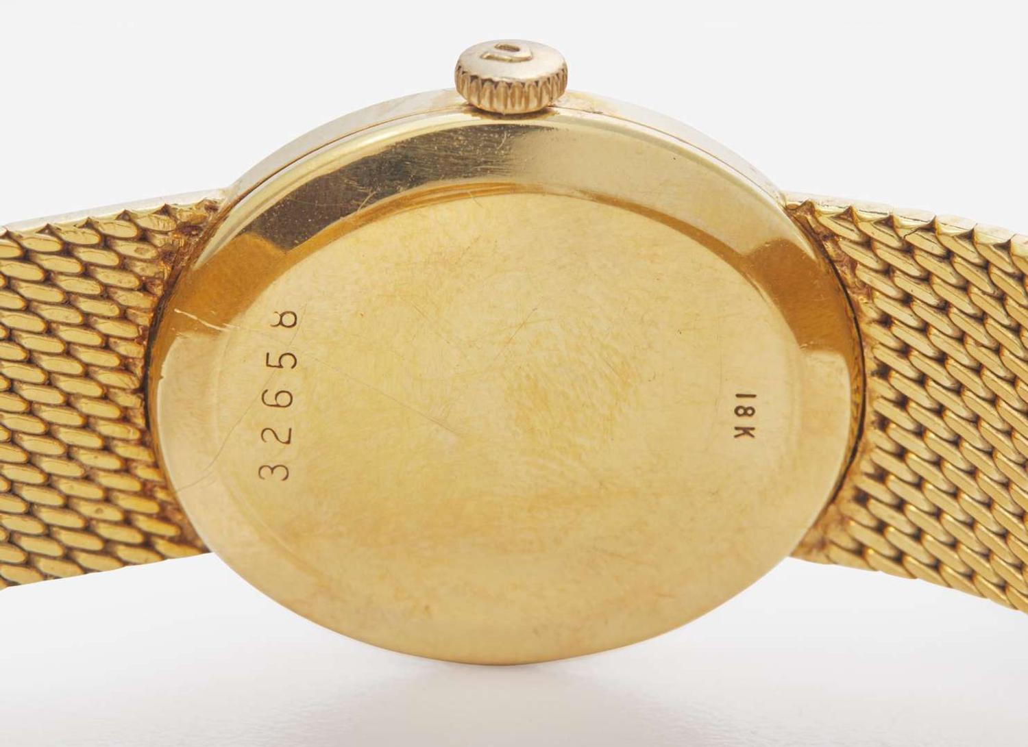 An 18K Yellow Gold Ladies Universal Geneve Watch
