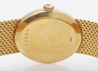 An 18K Yellow Gold Ladies Universal Geneve Watch