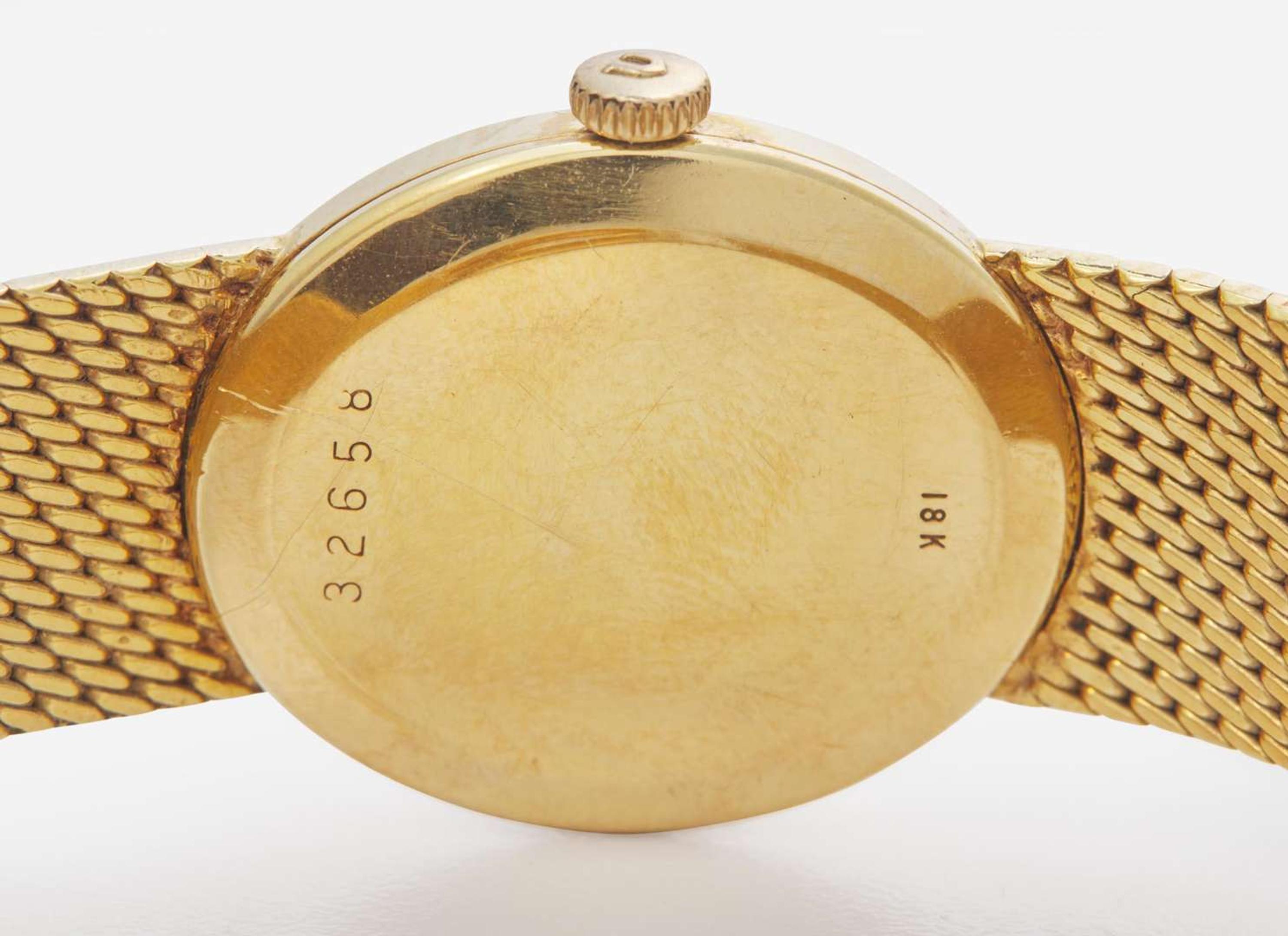 An 18K Yellow Gold Ladies Universal Geneve Watch