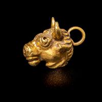 A Roman Gold Bull Pendant