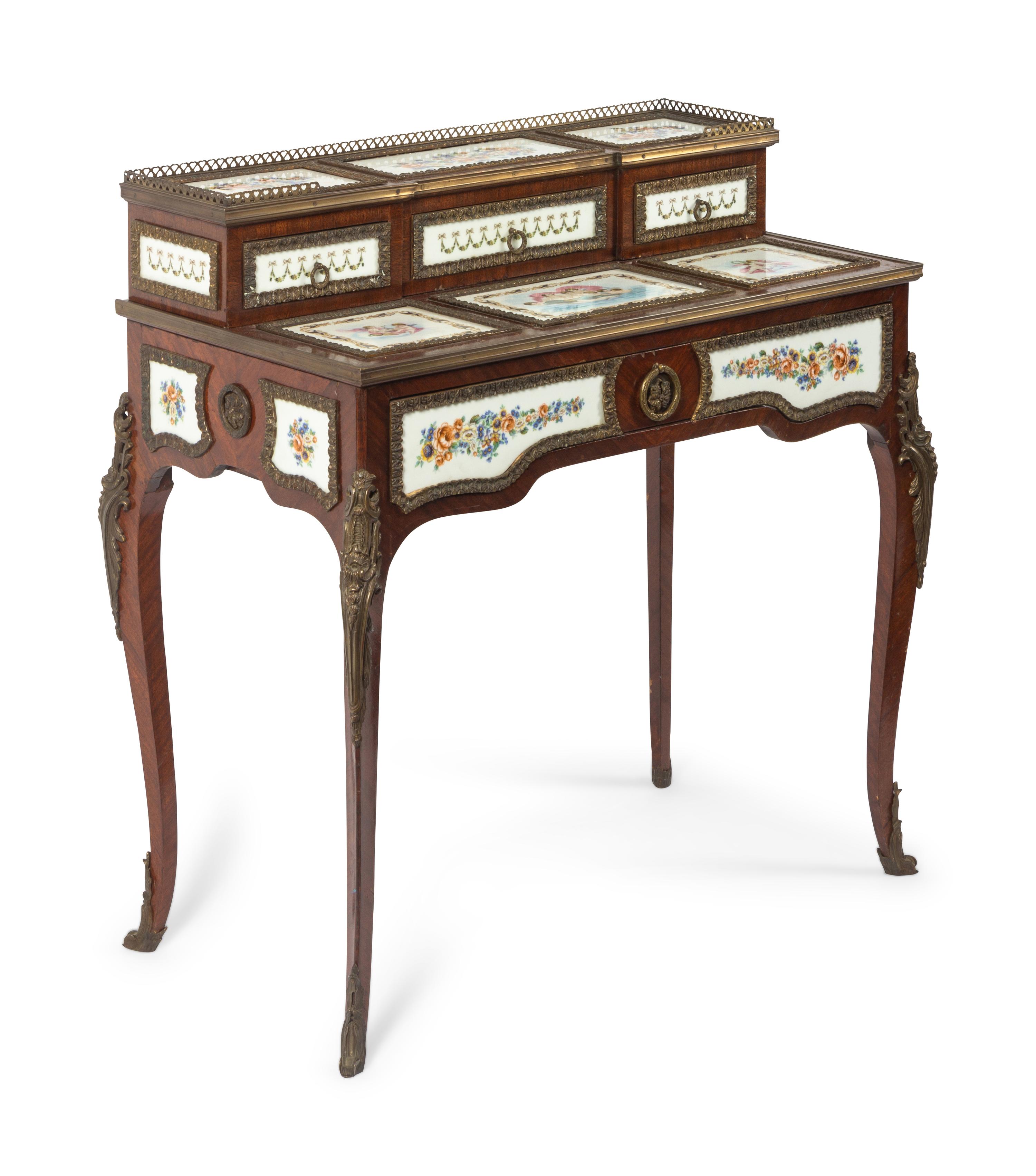 A Louis XV Style Porcelain and Gilt Bronze Mounted Dressing Table