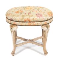 A Carved and Painted Oval Stool — 20TH CENTURY