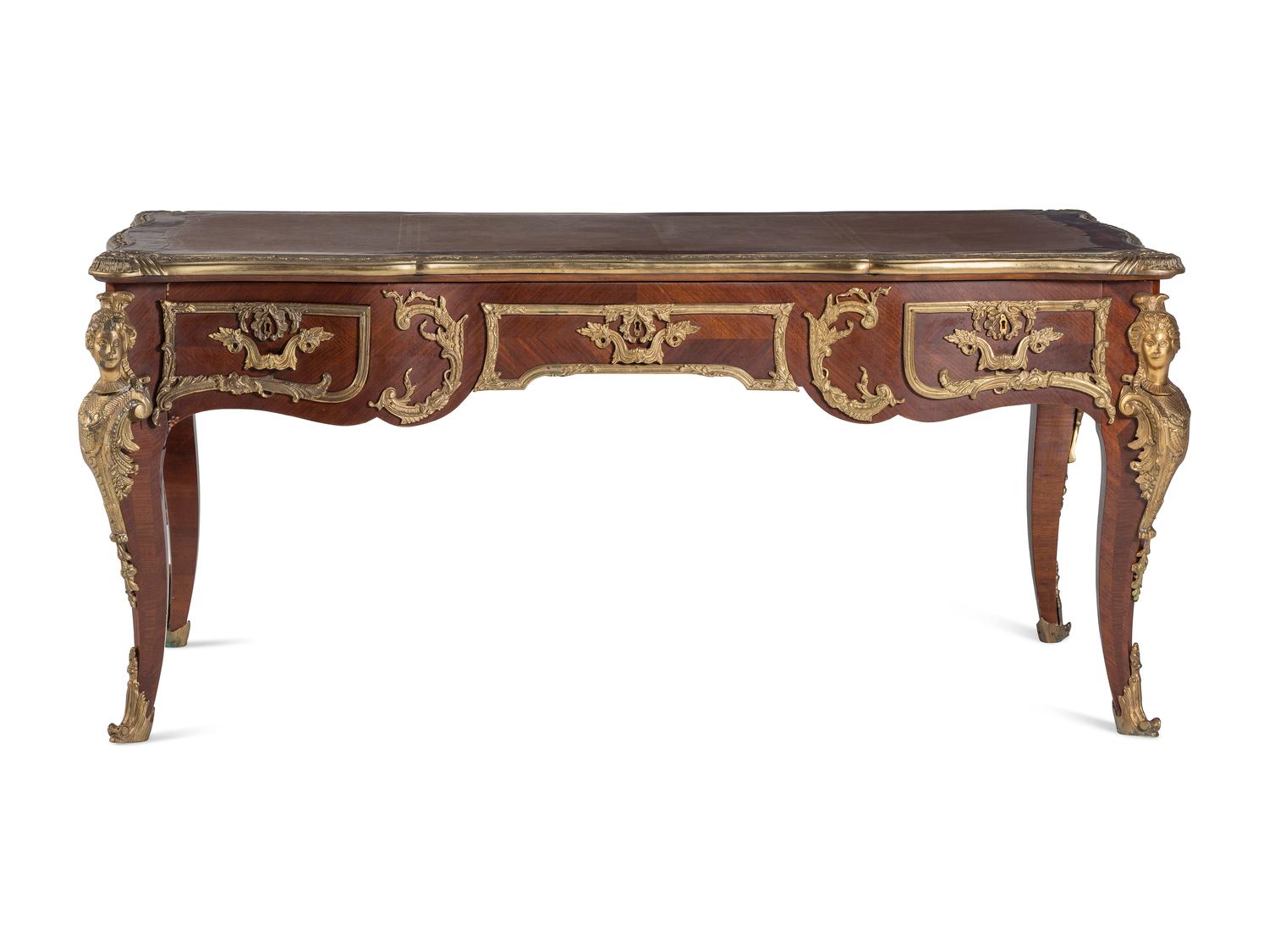 A Louis XV Style Gilt Bronze Mounted Mahogany Bureau Plat
