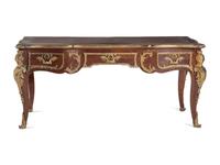 A Louis XV Style Gilt Bronze Mounted Mahogany Bureau Plat