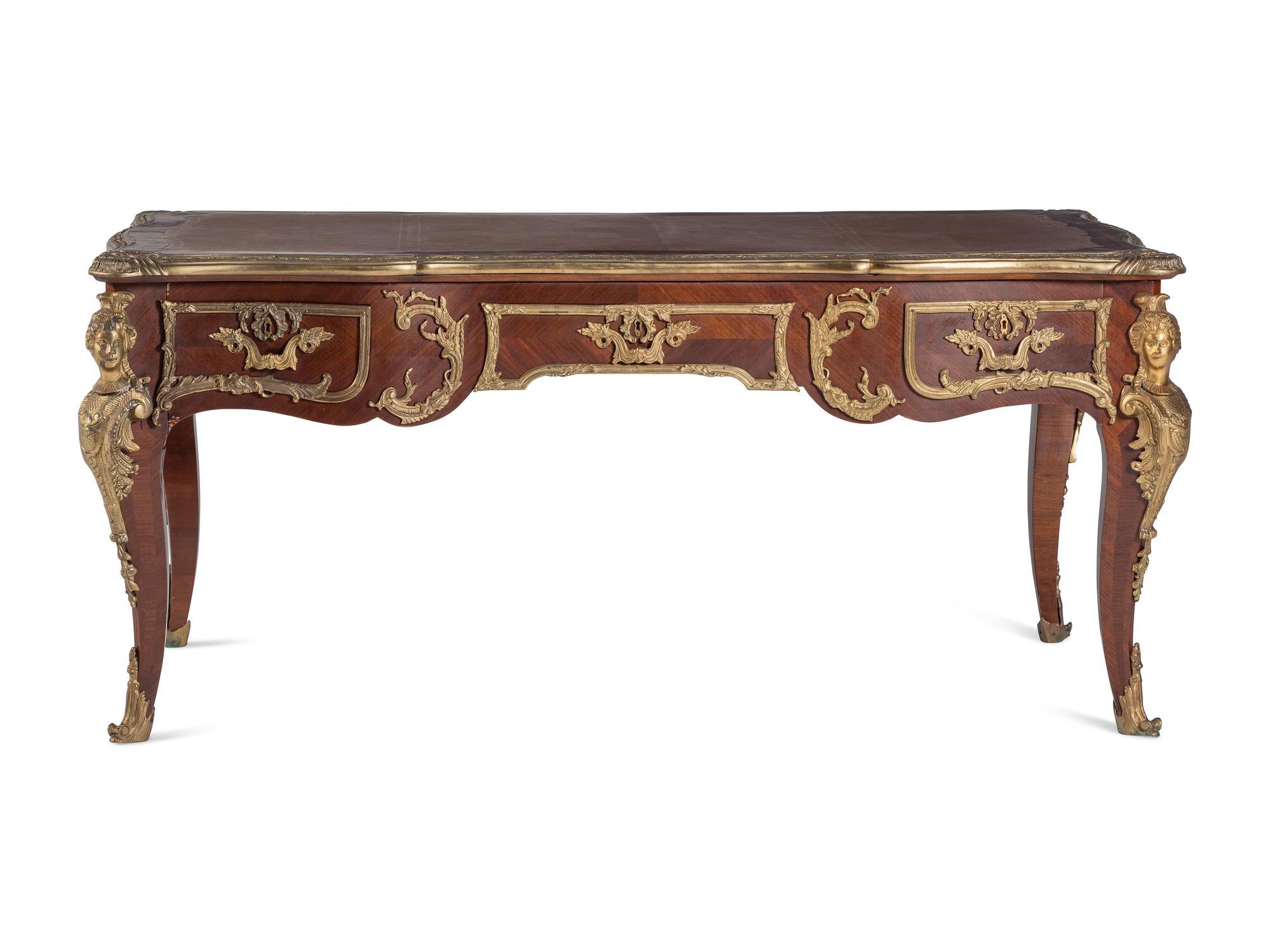 A Louis XV Style Gilt Bronze Mounted Mahogany Bureau Plat