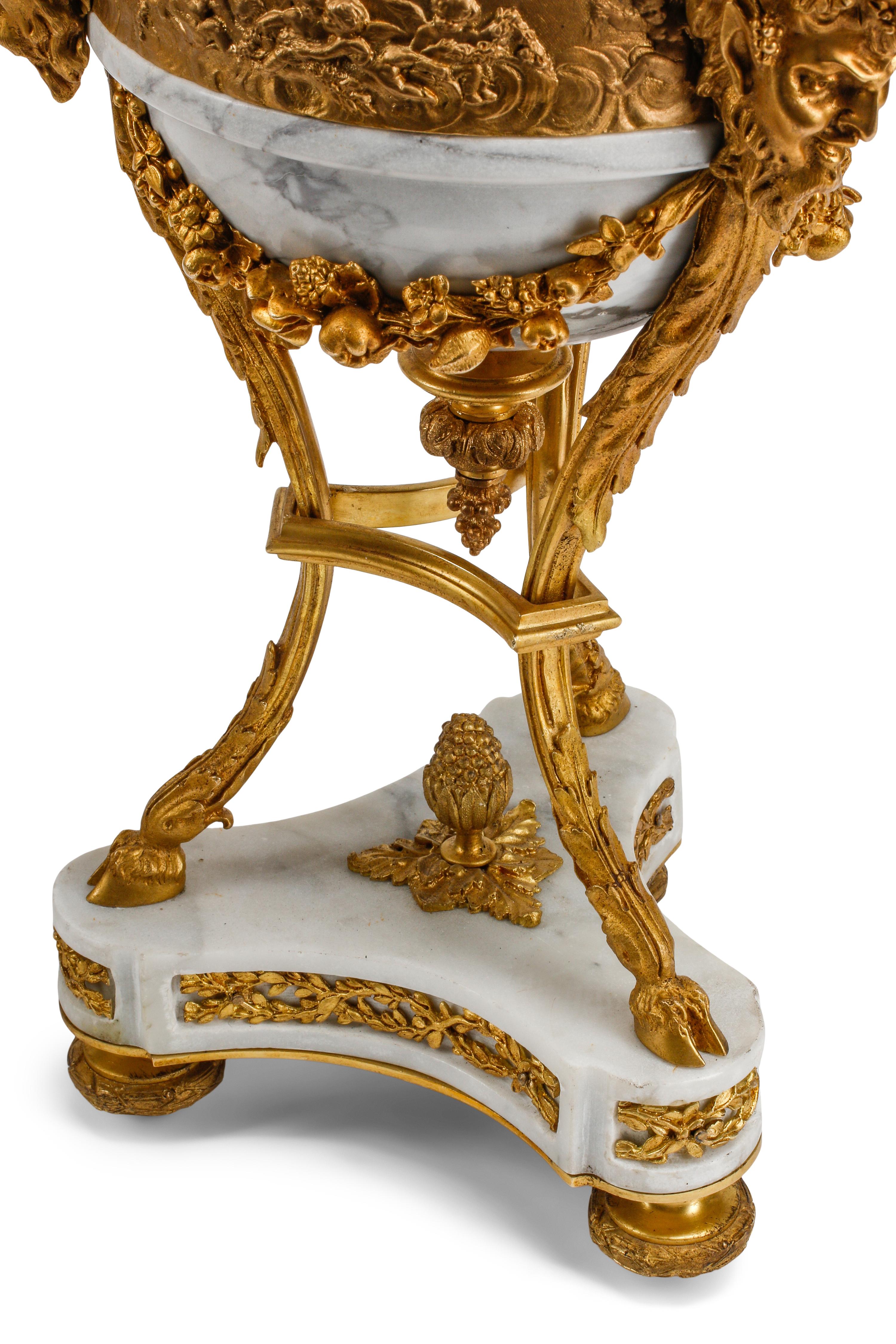A Pair of Louis XV Style Gilt Bronze and Marble Seven-Light Candelabra