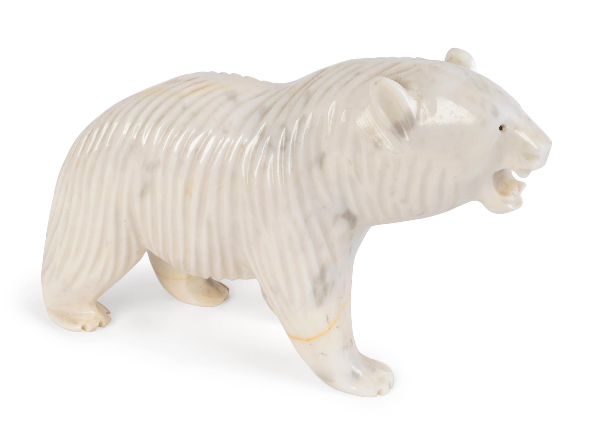 A Carved and Polished White Marble Figure of a Polar Bear