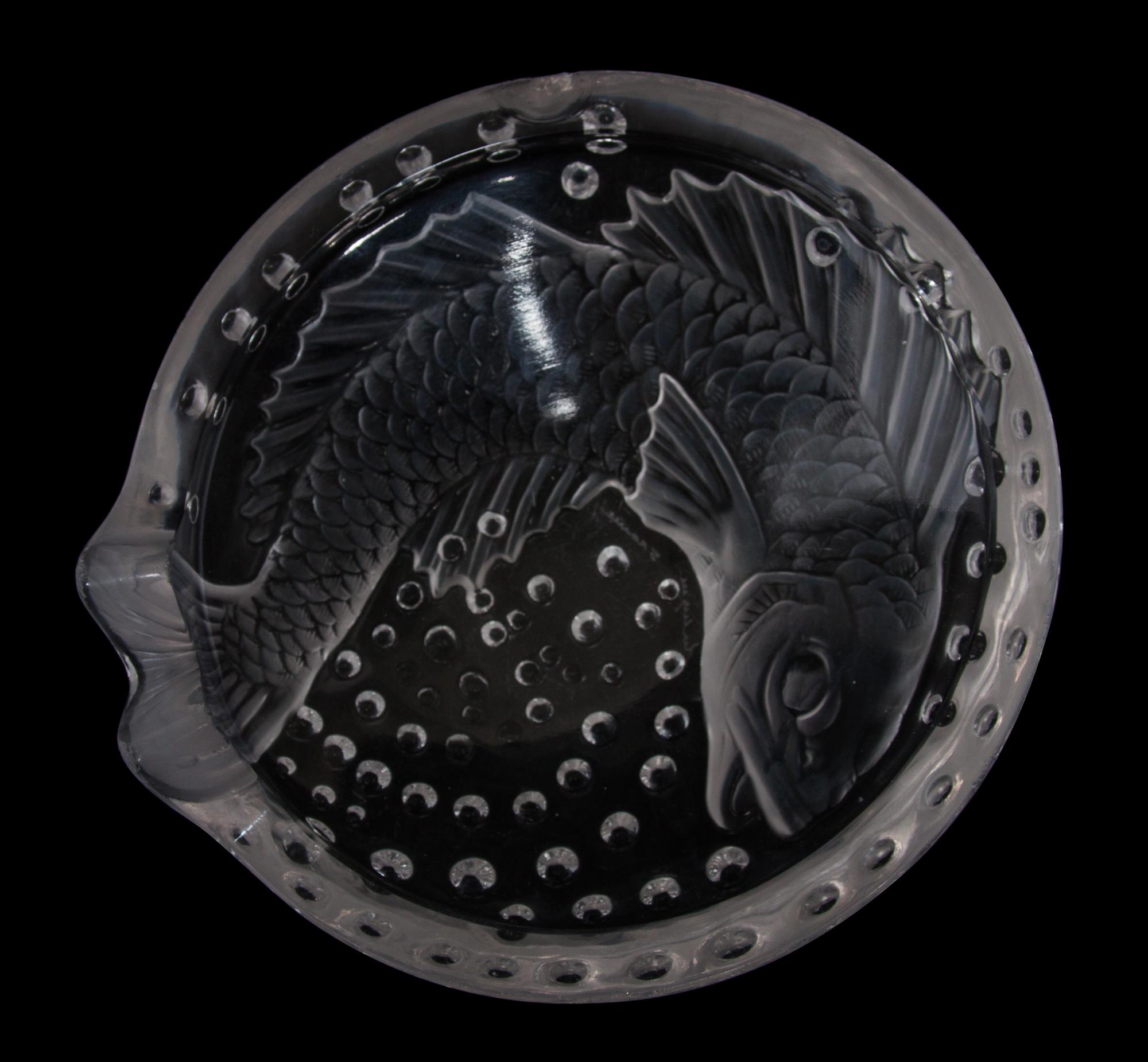 A Lalique Molded and Frosted Glass Ash Receiver Diameter 6 inches.
