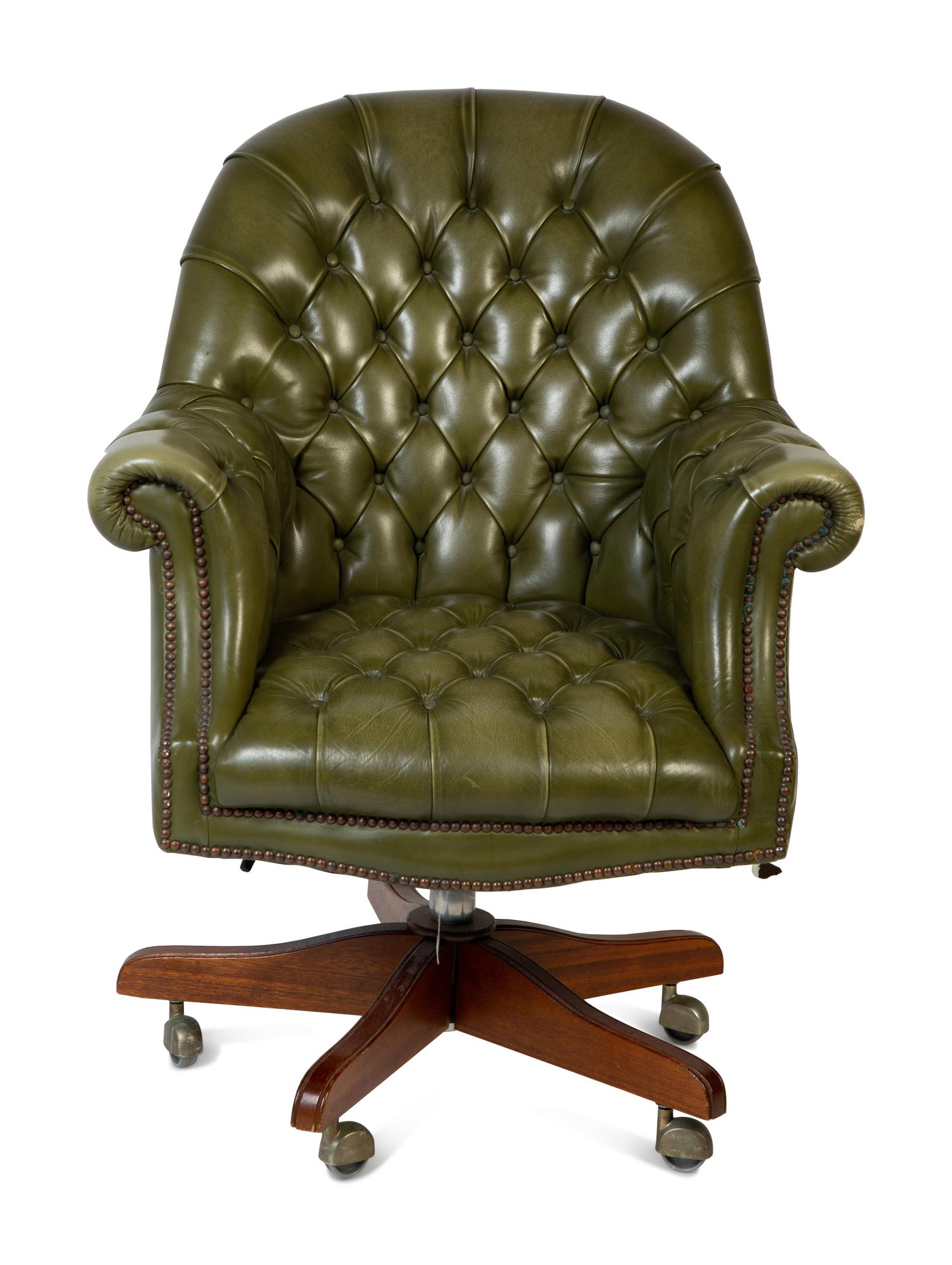 A Pair of English Button-Tufted Leather Swivel Chairs — SHEPARD, 20TH CENTURY