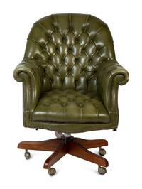 A Pair of English Button-Tufted Leather Swivel Chairs — SHEPARD, 20TH CENTURY