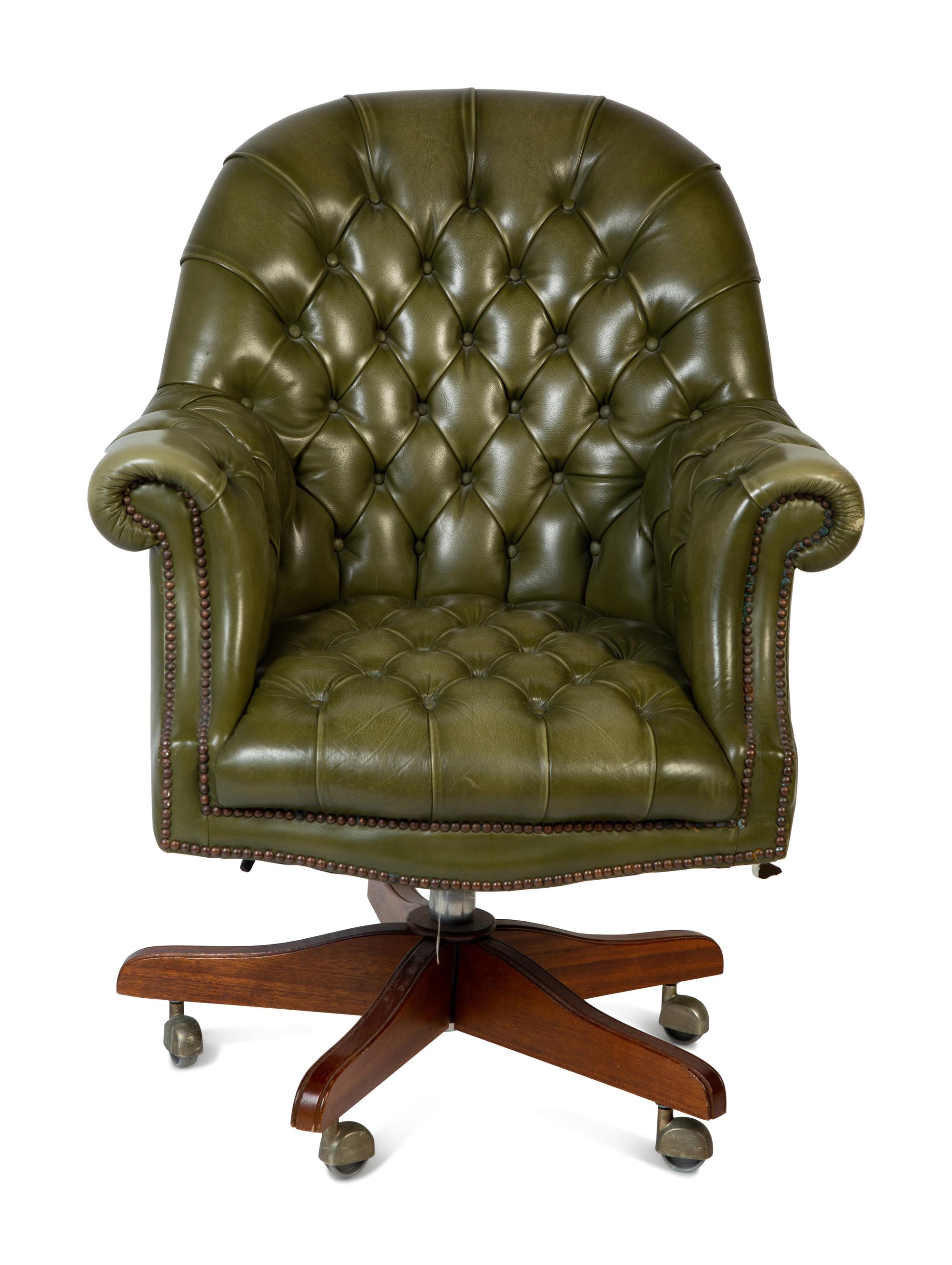 A Pair of English Button-Tufted Leather Swivel Chairs — SHEPARD, 20TH CENTURY