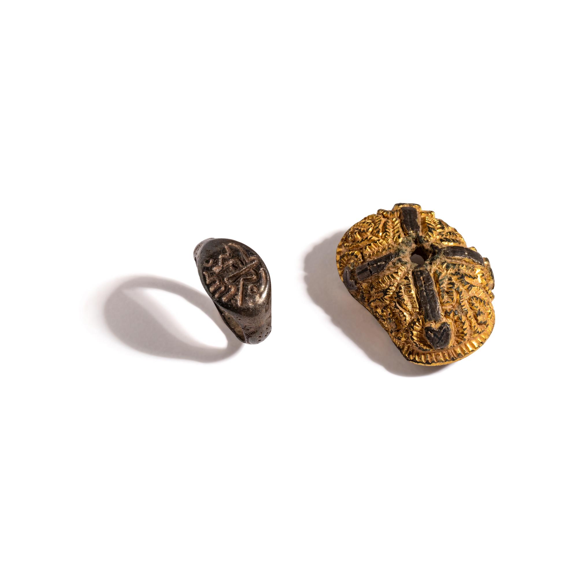 An Islamic Silver Ring and Byzantine Gilt-Silver Applique with Cross