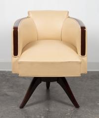 An Art Deco Style Armchair Height 29 1/2 x width 23 3/8 x depth 23 inches. — 20TH CENTURY
